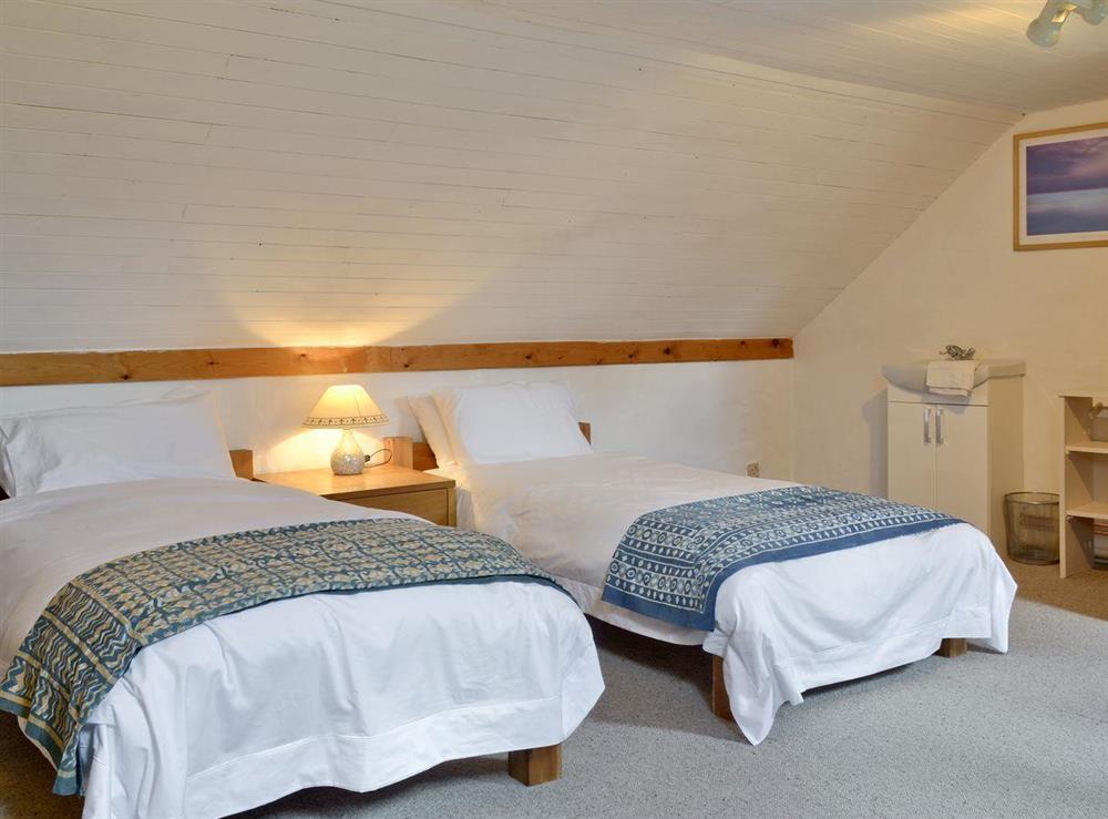 Relaxing twin bedroom at Old Smithy, 