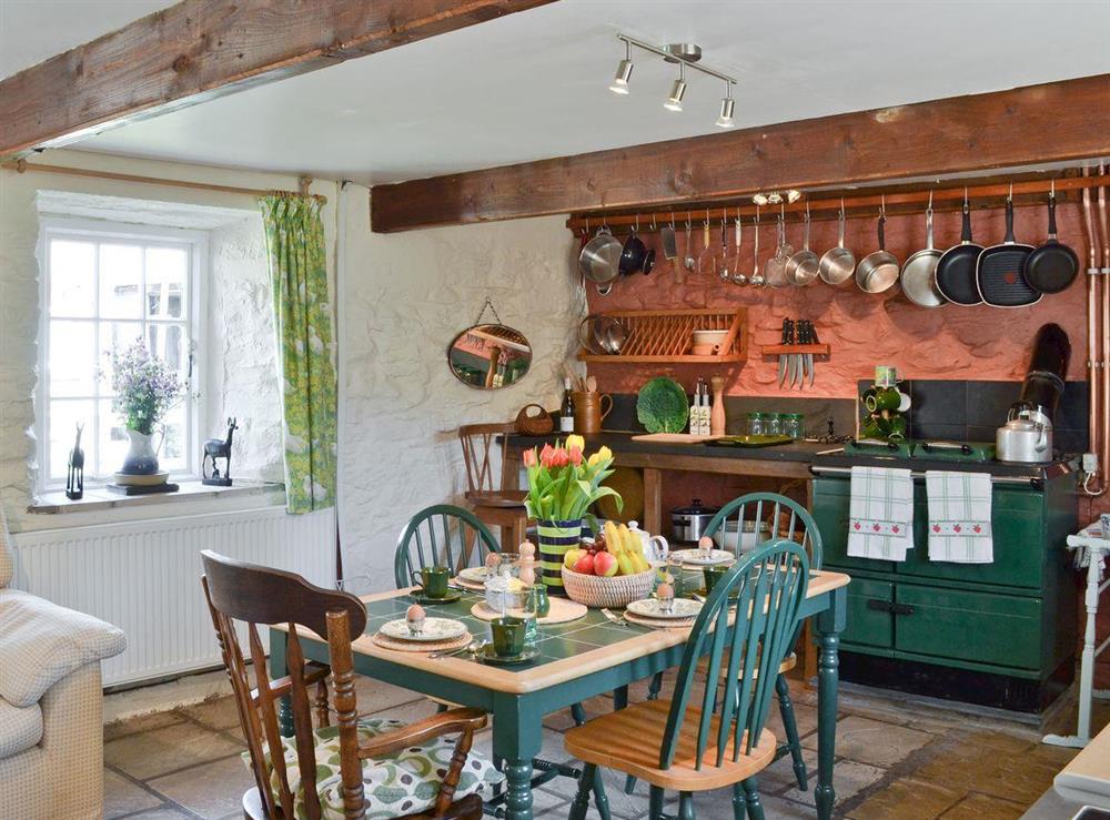 Traditional country kitchen and dining room at Old Smithy, 