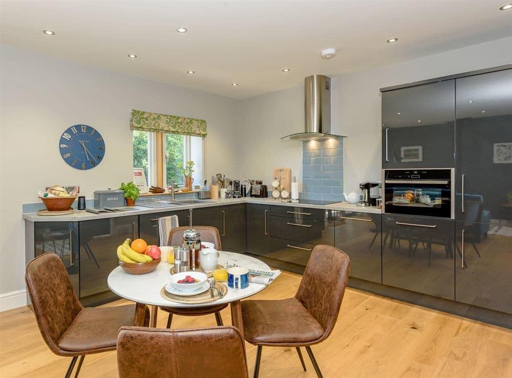 Kitchen and dining area at Hen Harrier Lodge in Abbeystead, near Lancaster, Lancashire