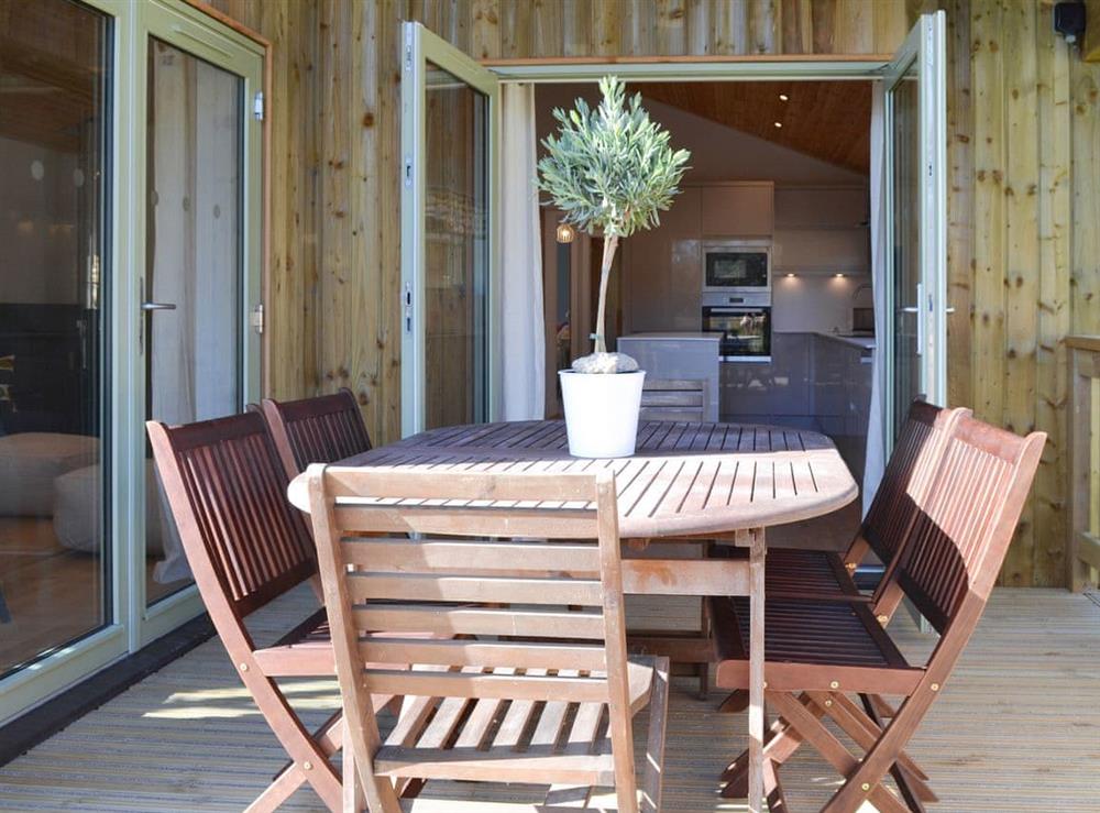 Outdoor dining area at Hen Harrier Lodge in St Columb Major, near Padstow, Cornwall