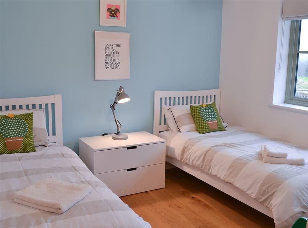 Twin bedroom at Hen Harrier Lodge in St Columb Major, near Padstow, Cornwall