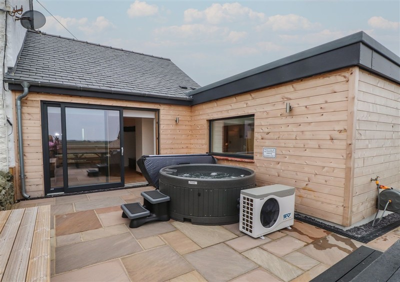 Enjoy the hot tub at Hen Penmynydd, Llanfwrog near Llanfachraeth