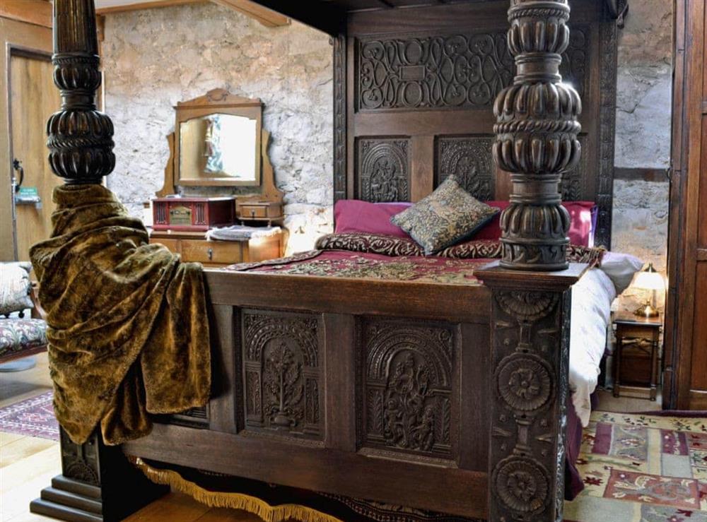 Spectacular, heavily carved, Elizabethan-style four poster bed at Hen Wrych Hall Tower in Abergele, Conwy., Great Britain