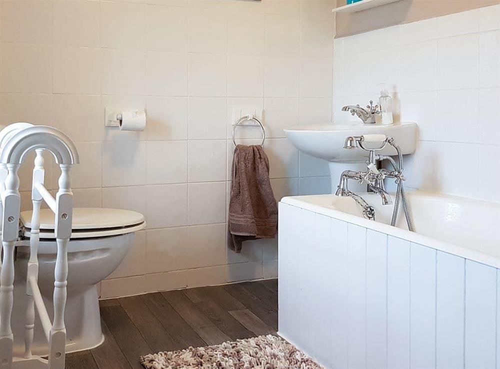 Bathroom with telephone style shower attachment at Hendy in Aberdaron, Lleyn Peninsula, Gwynedd