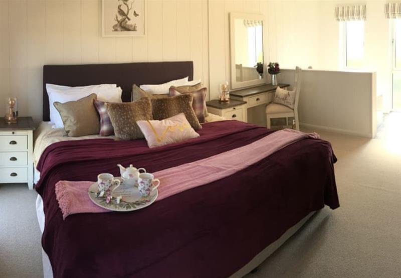 Double bedroom in the Rabbits Warren Lodge at Henfields Country Retreat in Cannington, South West
