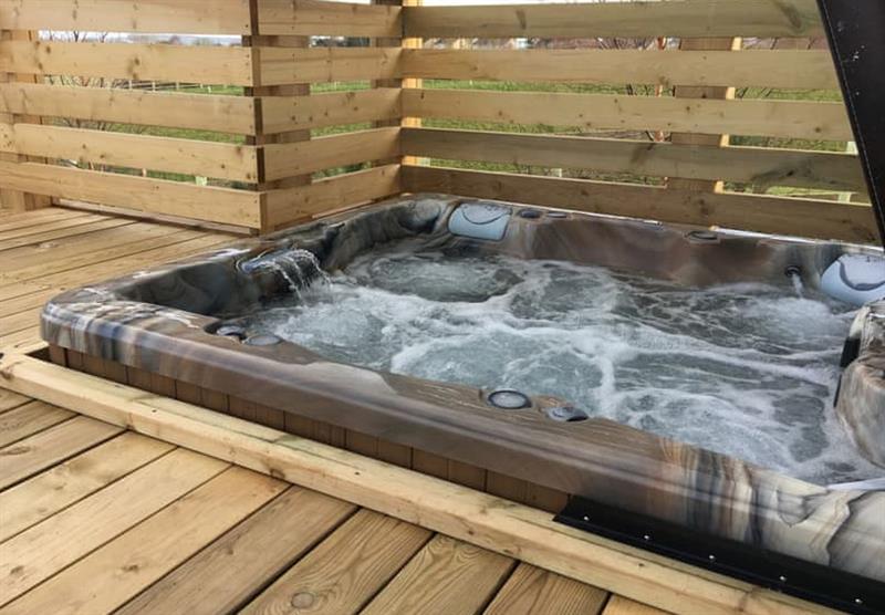 Hot tub in the Otters View Lodge at Henfields Country Retreat in Cannington, South West