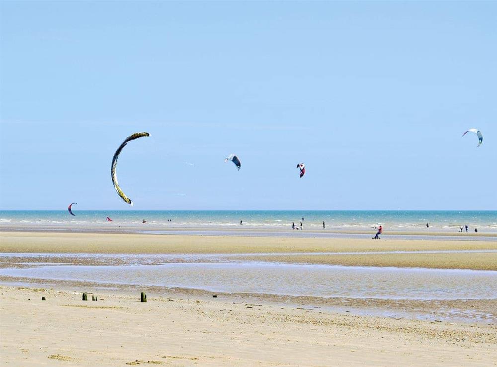 Camber Sands kite surfing at Henry Oscar House in Winchelsea, near Rye, Sussex, East Sussex