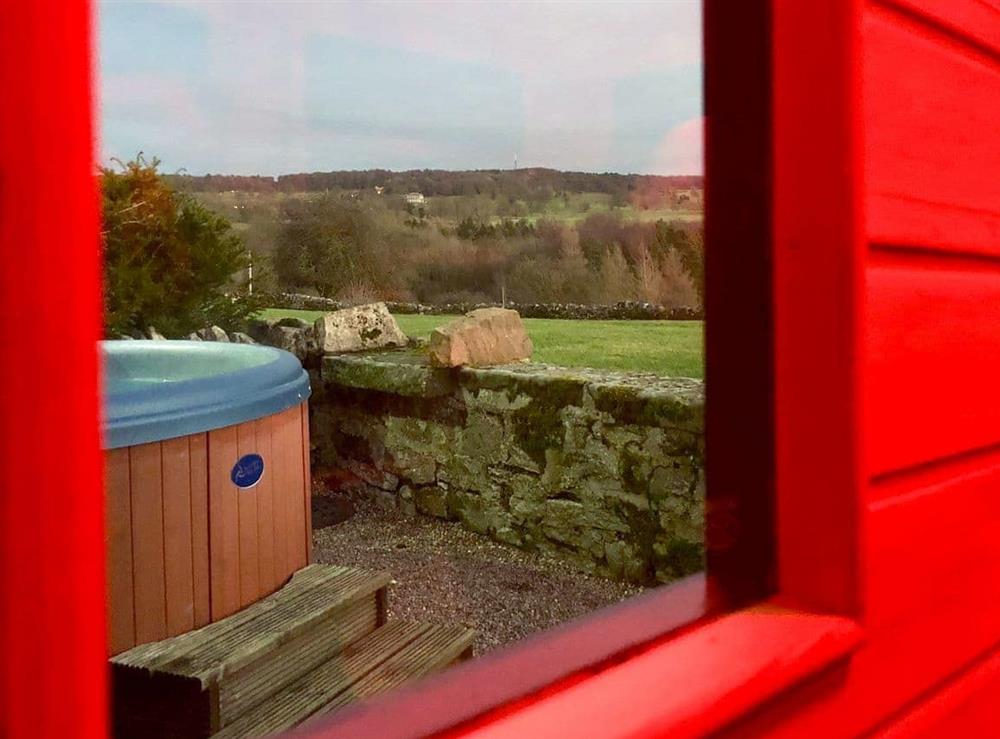 Infrared sauna looking out towards the countryside at Henry’s Haunt in Alport, Nr Bakewell, Derbyshire., Great Britain