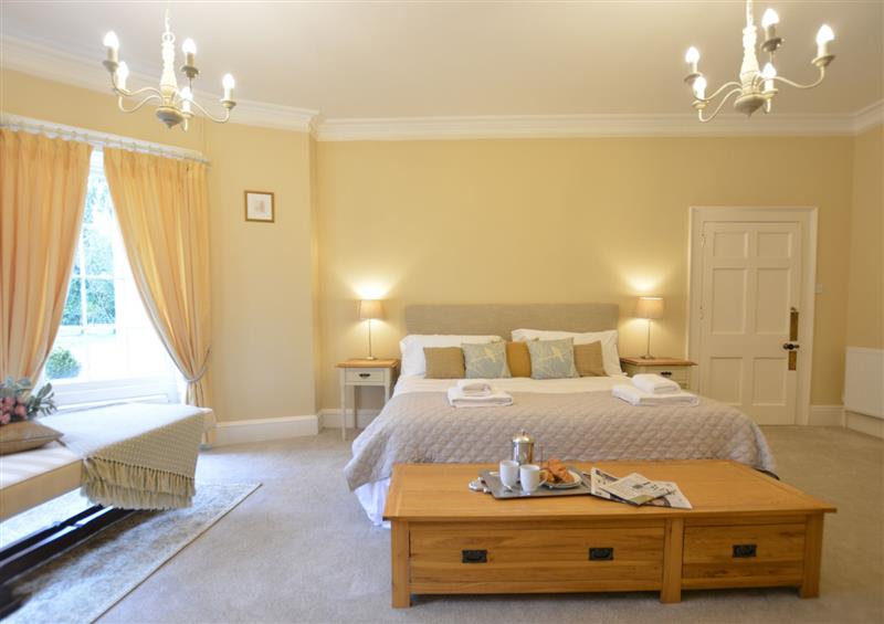 One of the 8 bedrooms at Henstead Hall with Apartment, Beccles