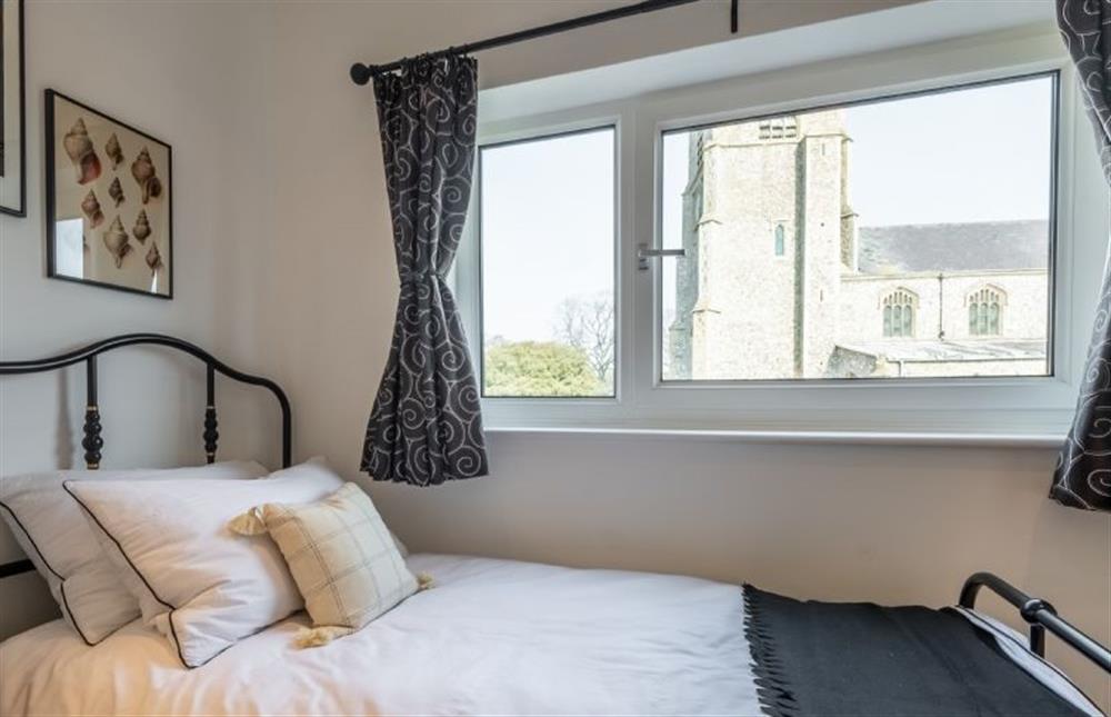 First floor: Bedroom three with a church view at Herberts, Wells-next-the-Sea