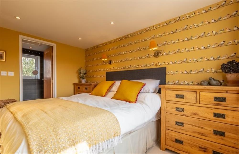 First floor: Master bedroom with king-size bed at Herberts, Wells-next-the-Sea