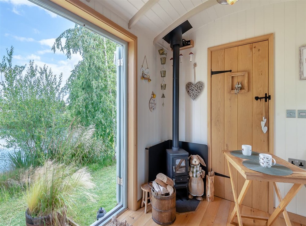 Open plan living space at Herbies Shepherd Hut in Nottingham, Leicestershire