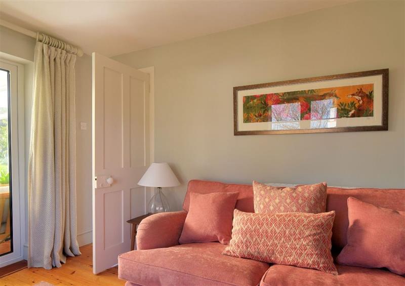 Relax in the living area at Hernelee Cottage, Lyme Regis