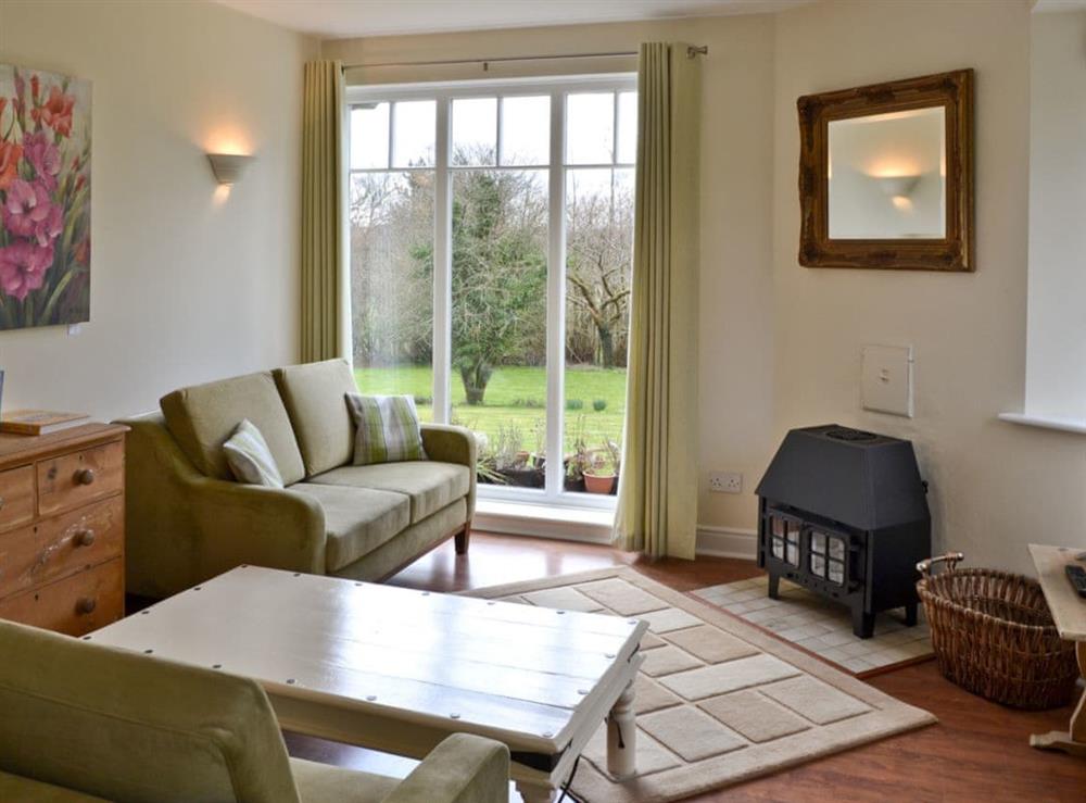 Living room at Heron Cottage in Timsbury, near Romsey, Hampshire
