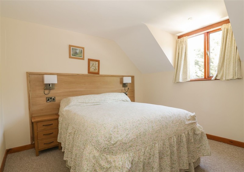 A bedroom in Heron Cottage (photo 2) at Heron Cottage, Wayford