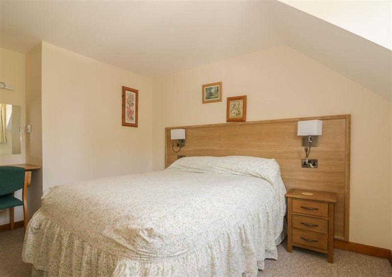 This is a bedroom at Heron Cottage, Wayford