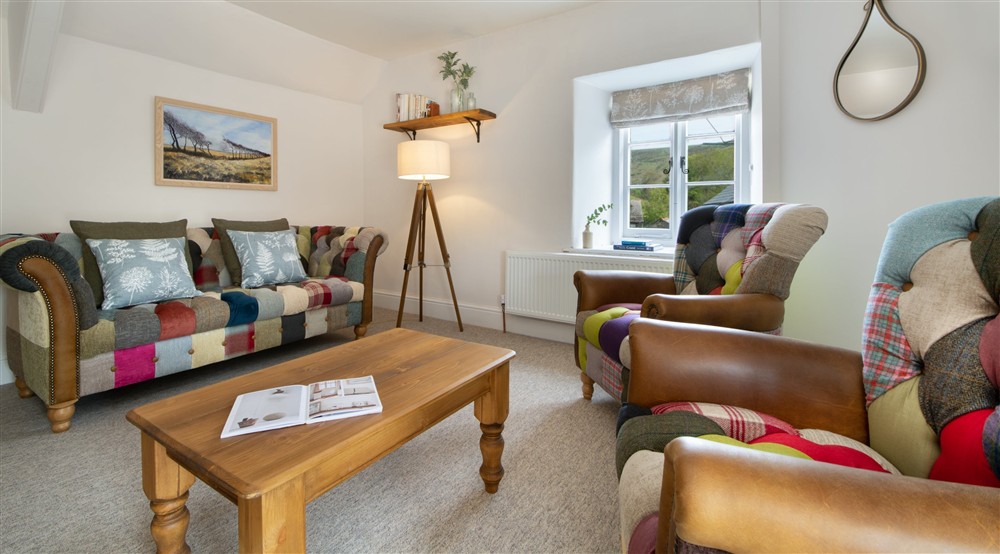 The sitting and dining room (photo 2) at Heron View in Malmsmead, Exmoor