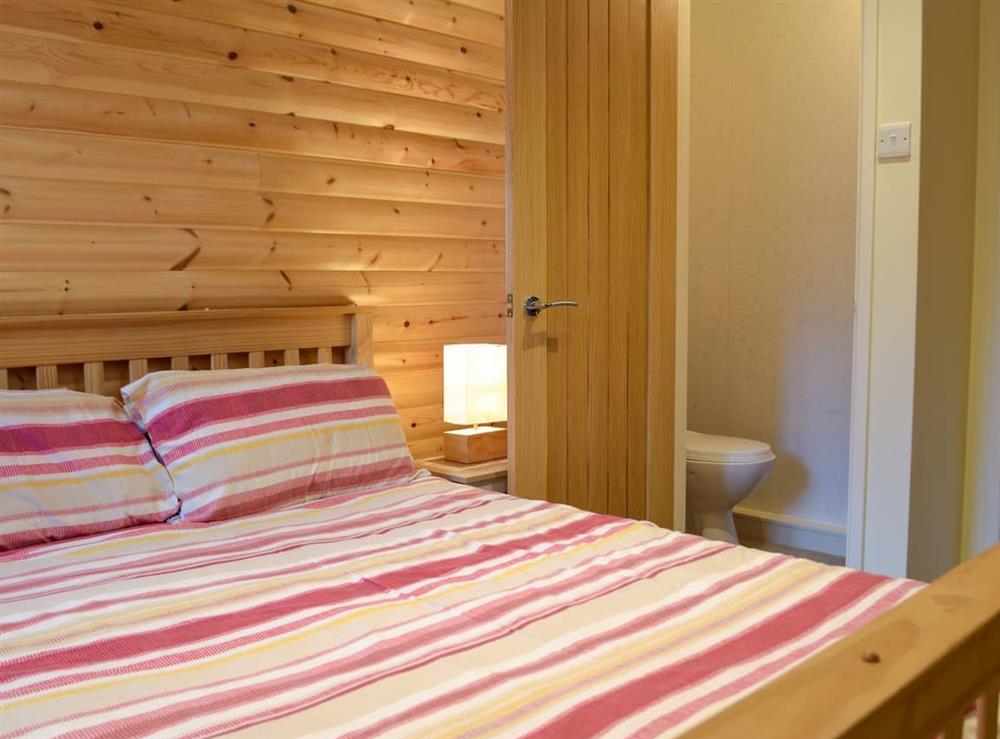Comfortable double bedroom (photo 2) at Herons Log Cabin in Rosebush, Dyfed