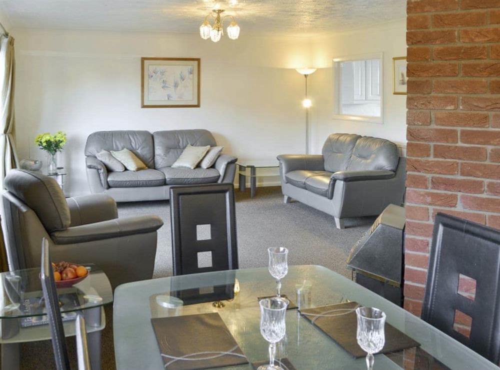 Attractive living and dining room at Heron’s Quay in Wroxham, Norfolk