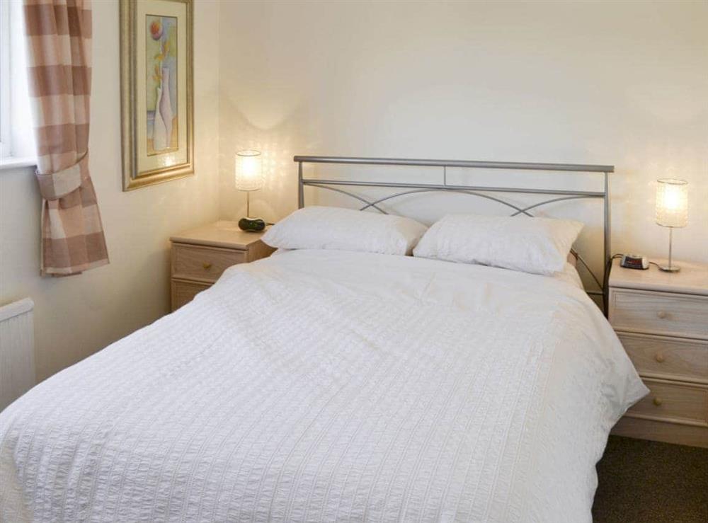 Comfortable double bedroom at Heron’s Quay in Wroxham, Norfolk
