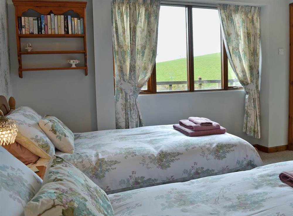 Charming twin bedroom with en-suite shower room (photo 2) at The Linhay, 