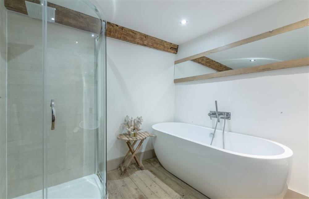 First floor: En-suite bathroom with separate shower cubicle at Hideaway Barn, Thornham near Hunstanton