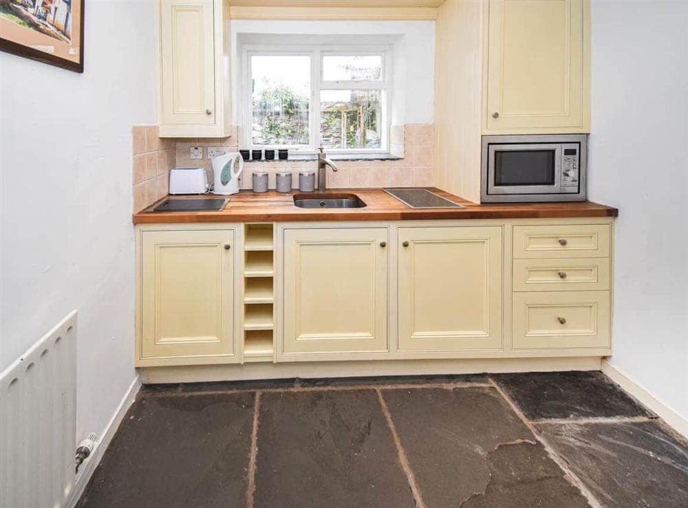 Kitchen area at Hideaway Cottage in Keswick, Cumbria