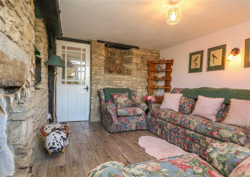 Relax in the living area (photo 2) at Higgledy Piggledy Cottage, Swanage