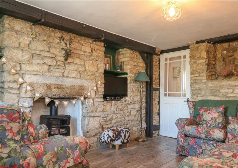 Relax in the living area at Higgledy Piggledy Cottage, Swanage