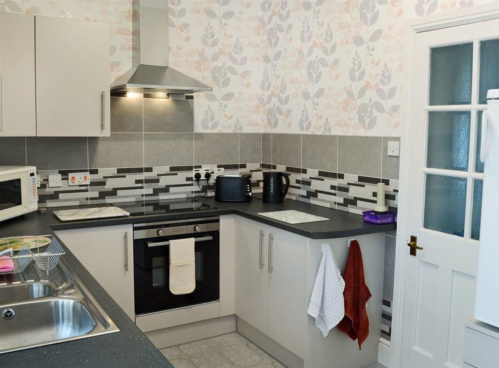 Modern fitted kitchen at High Bank in Bunbury, Cheshire