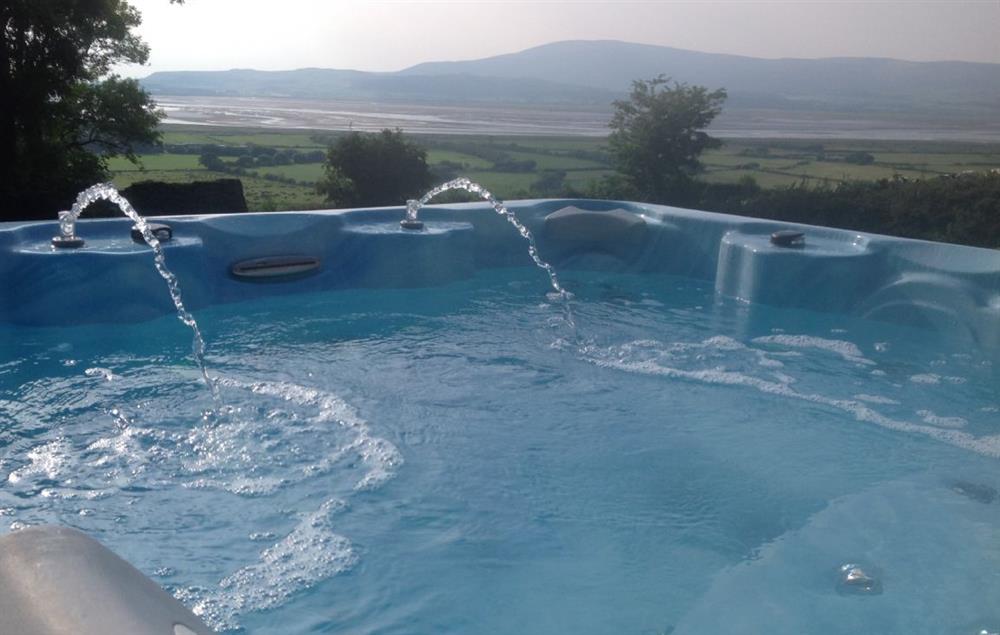 Outdoor hot tub with stunning views (photo 2) at High Bridge Haven, Kirkby-in-Furness
