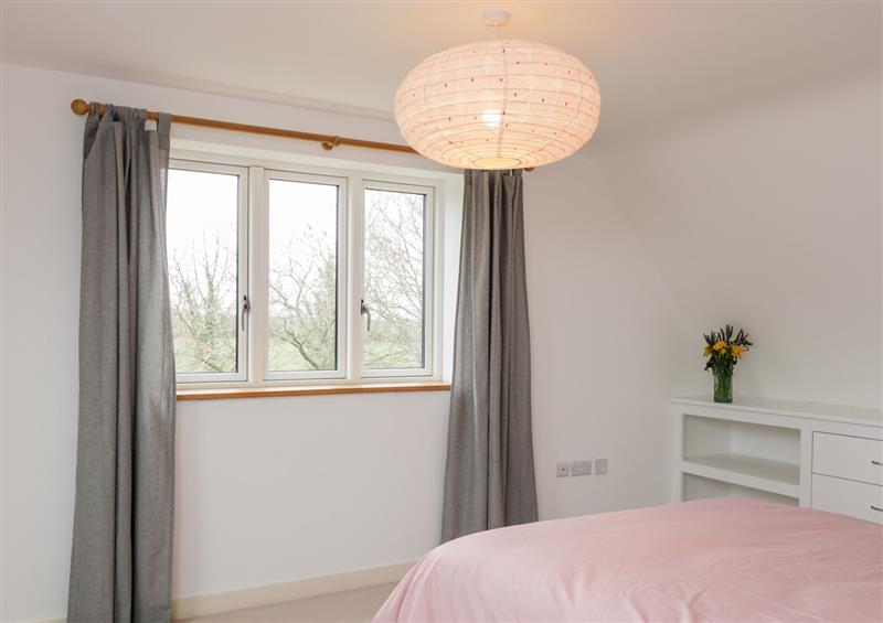One of the bedrooms (photo 2) at High Cogges Farm Holiday Cottages, Witney