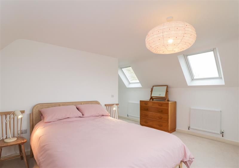 One of the bedrooms at High Cogges Farm Holiday Cottages, Witney