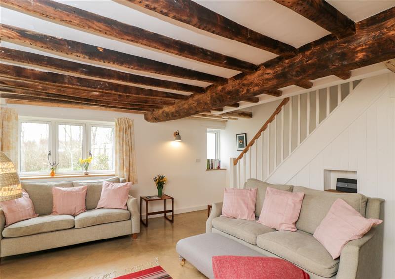 The living room at High Cogges Farm Holiday Cottages, Witney