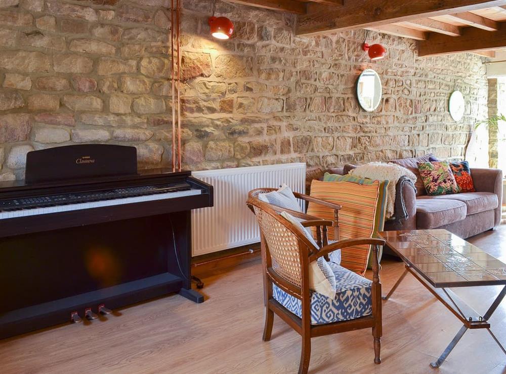 Charming living room at High House Cottage in Addingham, near Ilkley, West Yorkshire