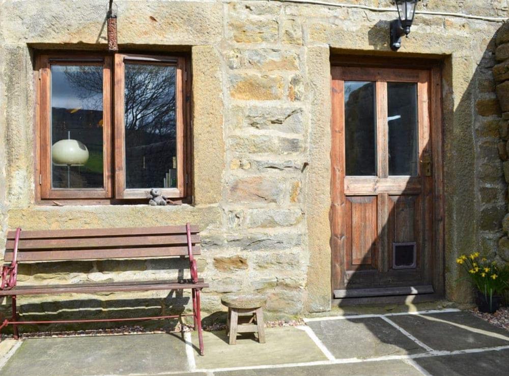 Lovely sunny patio area to the front at High House Cottage in Addingham, near Ilkley, West Yorkshire