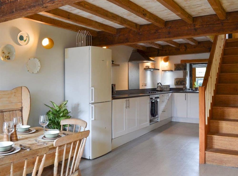 Spacious kitchen/diner with beams at High House Cottage in Addingham, near Ilkley, West Yorkshire