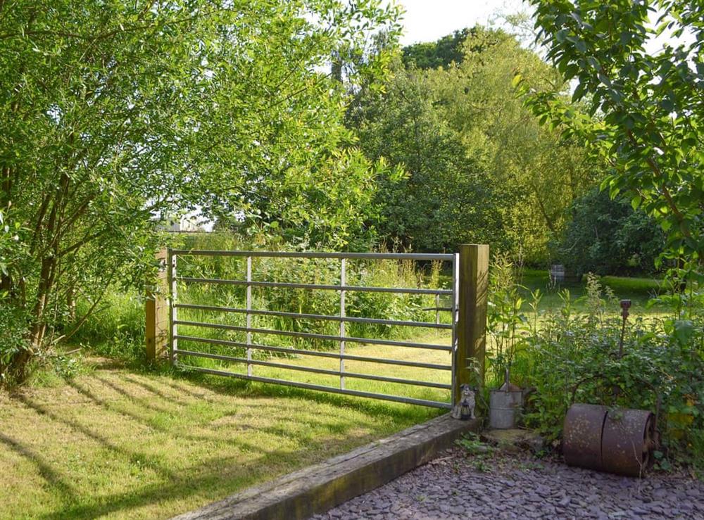Gate from patio to orchard at Wheelwrights, 