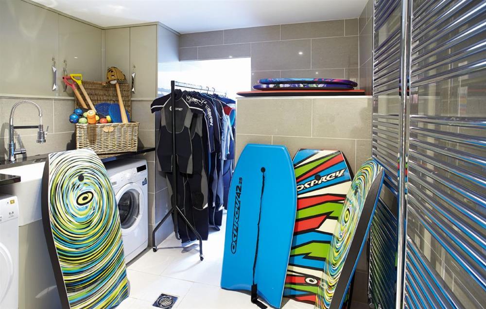 A generous supply of boogie boards and wet suits at High House (Sleeping 10), Tenby