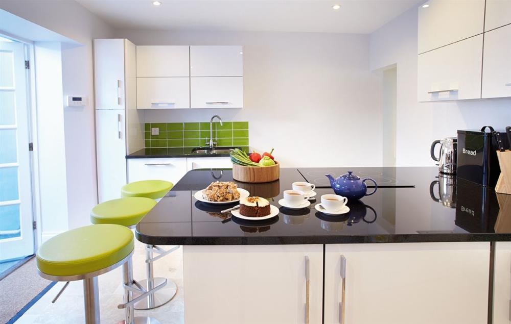 The modern kitchen on the ground floor at High House (Sleeping 10), Tenby