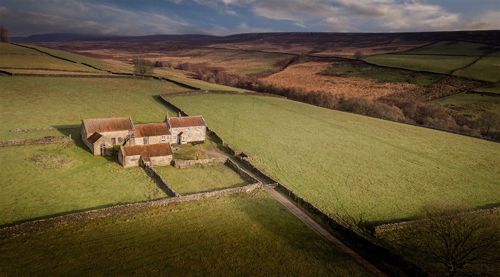 The exterior of High Lidmoor Farmhouse and the surrounding fields, Yorkshire (photo 2) at High Lidmoor Farmhouse in Kirkbymoorside, North Yorkshire