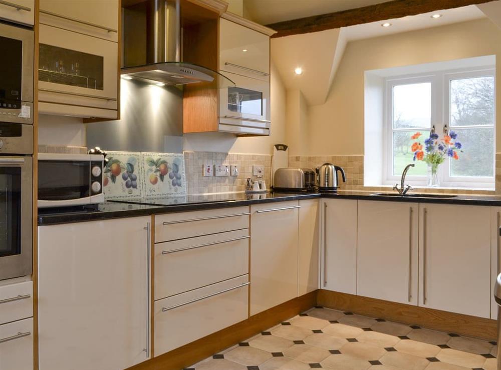 Well-equipped fitted kitchen at High Rigg (VB Gold Award) in Keswick, Cumbria