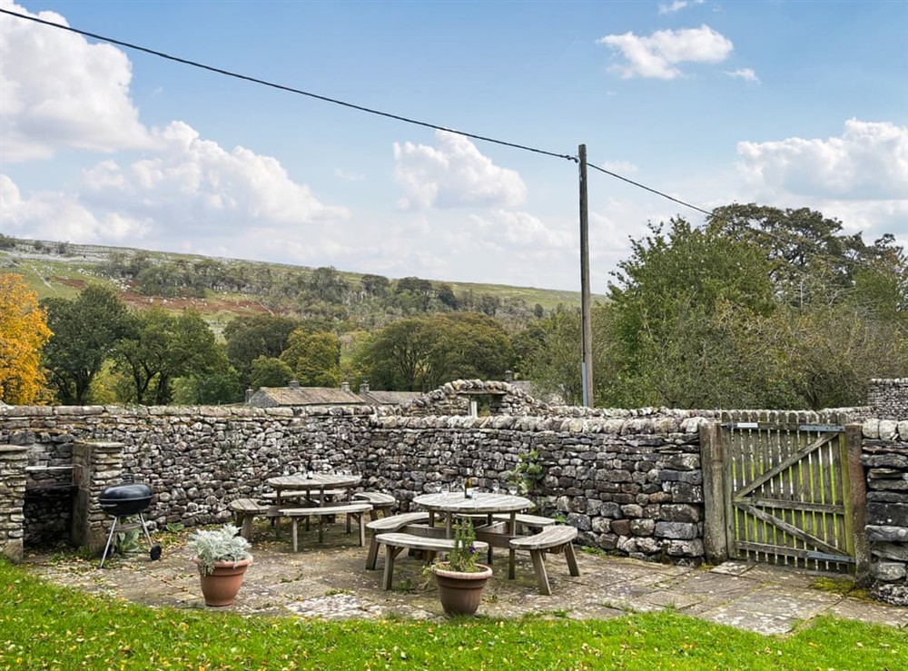 Garden seating and bbq area at High Rylands in Arncliffe, North Yorkshire