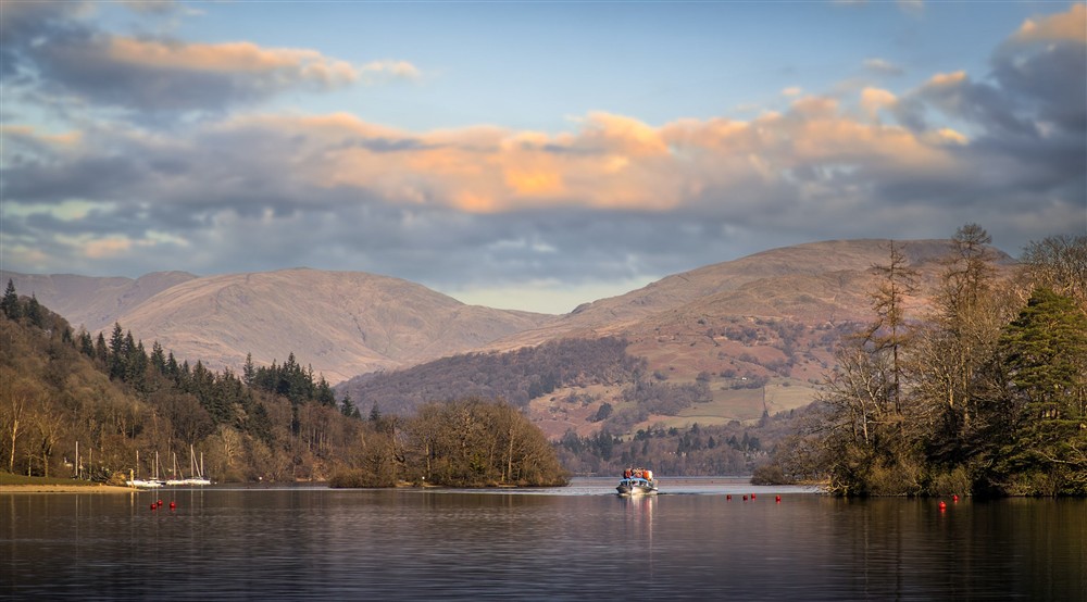 A boat on Lake Windermere, Cumbria at High Strawberry Gardens in Near Hawkshead, Cumbria