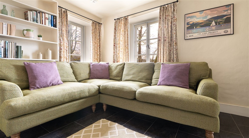 The corner sofa in the sitting room at High Strawberry Gardens in Near Hawkshead, Cumbria