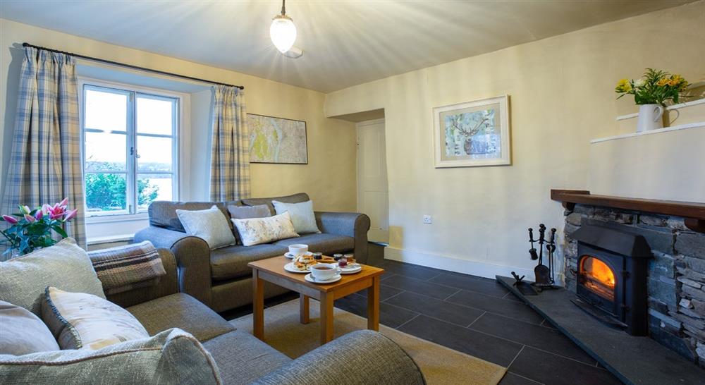 The cosy sitting room at High Strawberry Gardens in Near Hawkshead, Cumbria