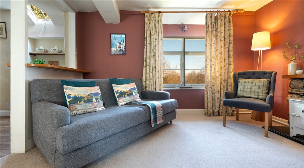 The open-plan kitchen and sitting room at High Strawberry Gardens in Near Hawkshead, Cumbria