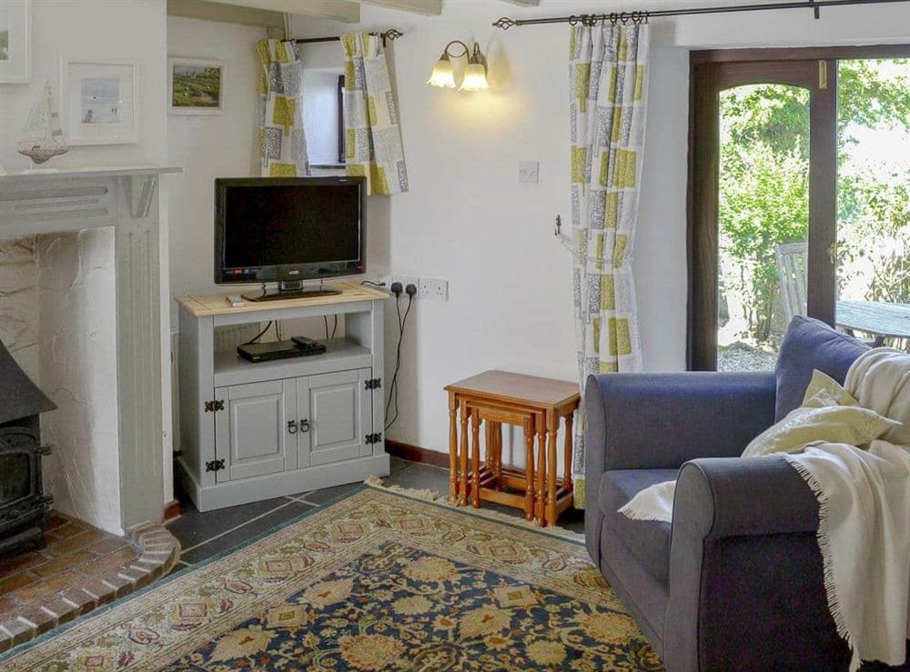 Charming living/ dining room with cosy wood burner (photo 2) at High View in St Breward, Cornwall