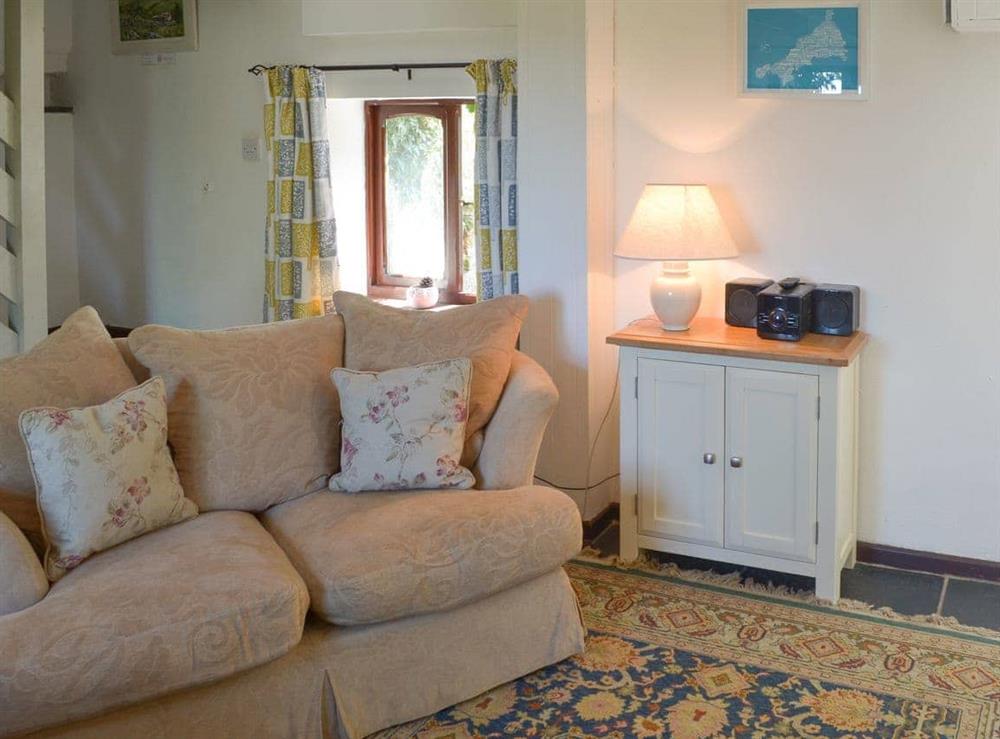 Charming living/ dining room with cosy wood burner (photo 4) at High View in St Breward, Cornwall