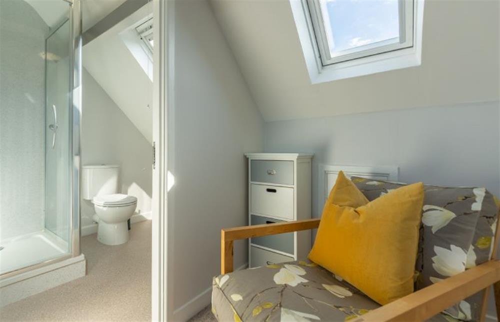 First floor: A comfy seating area in bedroom two at High View, Wells-next-the-Sea